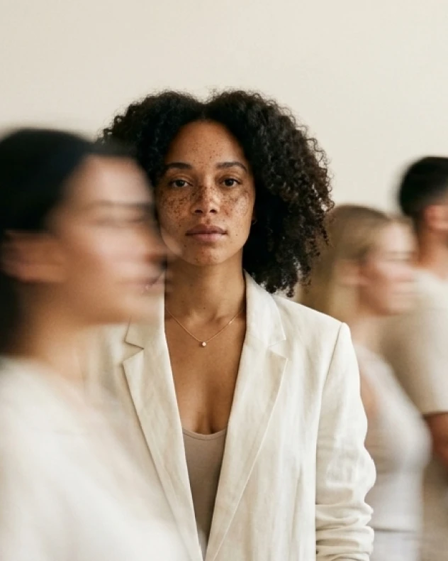 Woman blurred people walking by